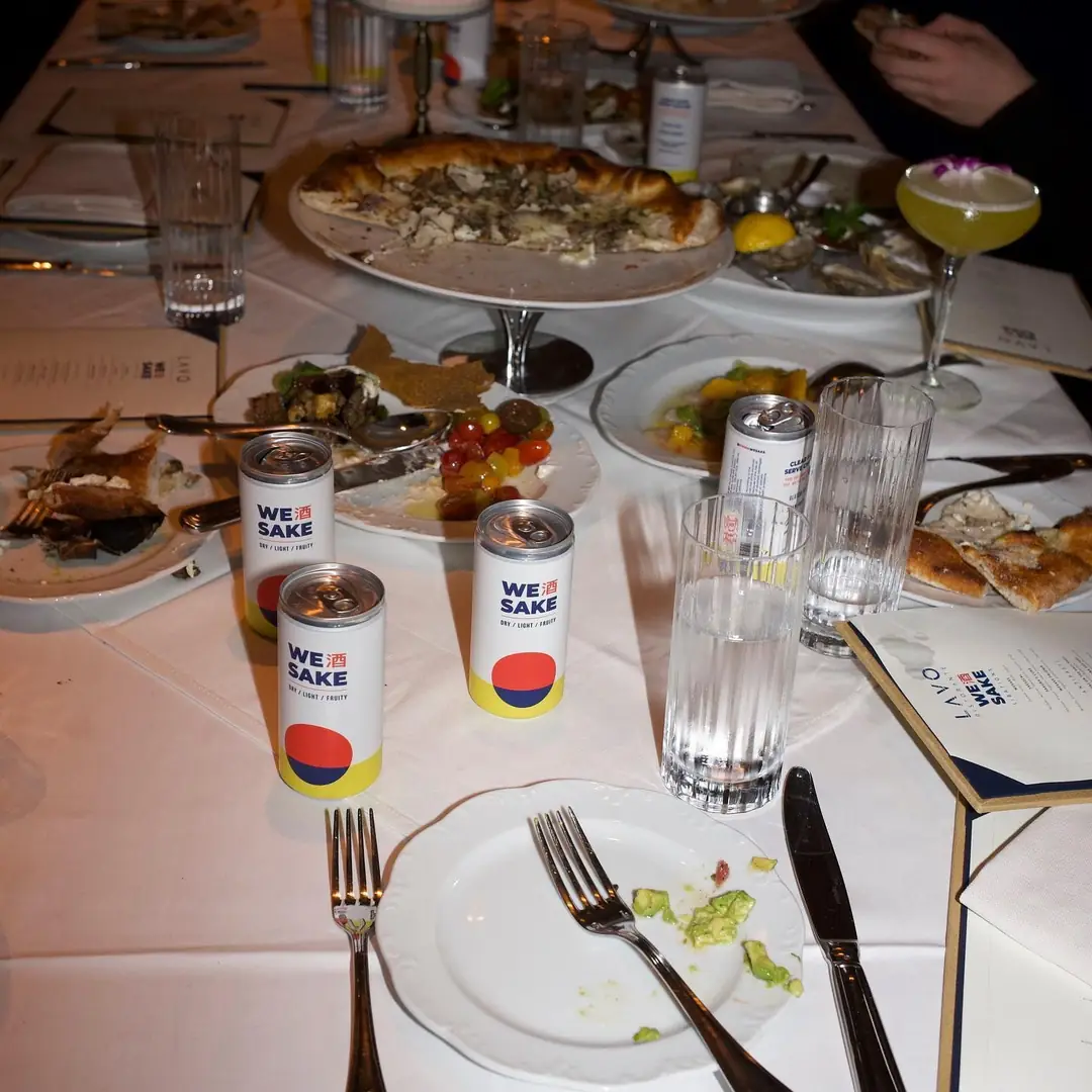 WESAKE cans on a dinner table