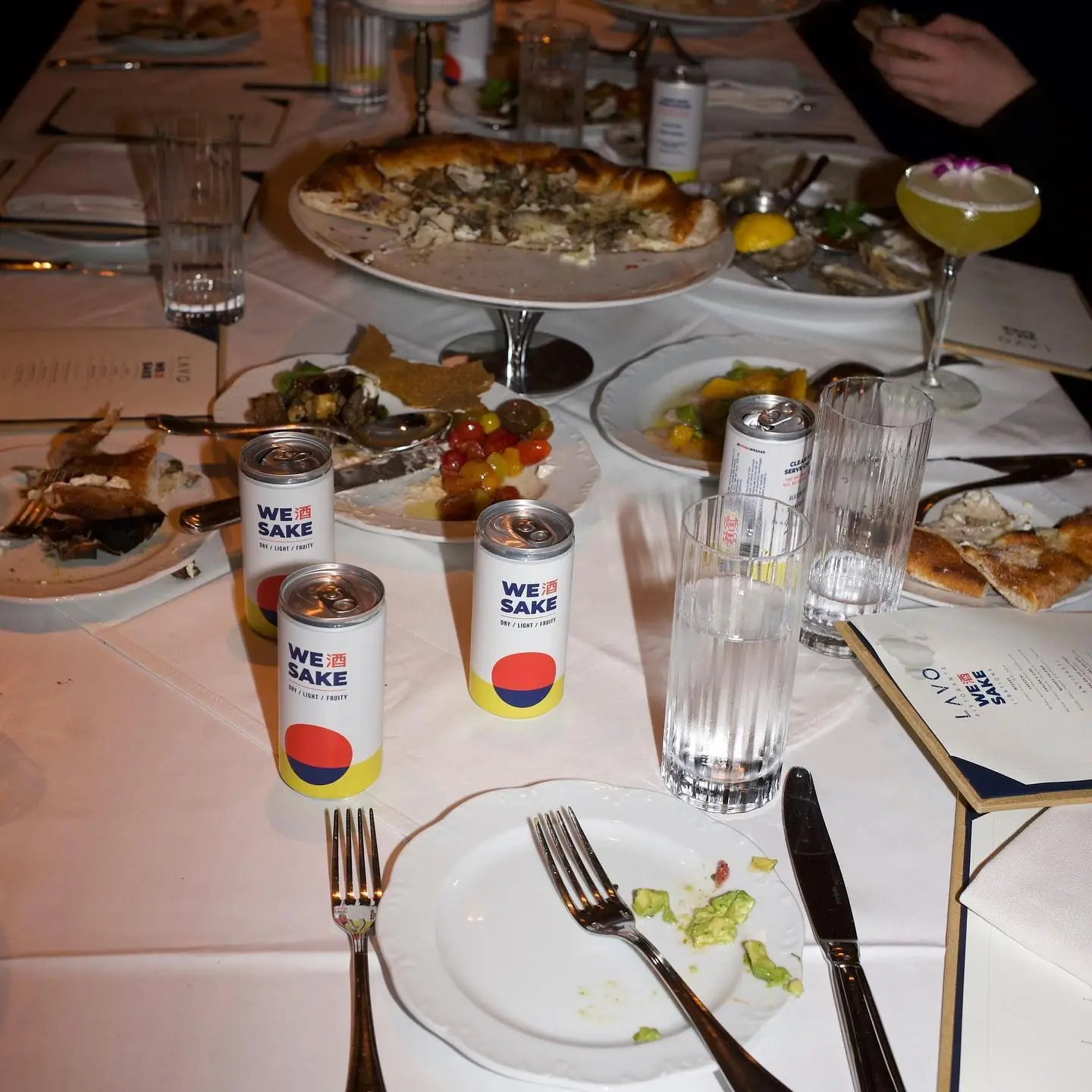 WESAKE cans on a dinner table
